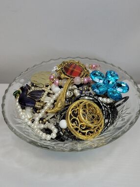 Assorted Women's Jewelry In A Glass Dish